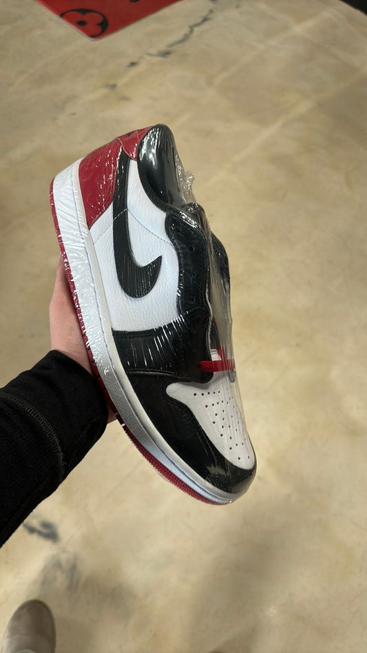 Jordan 1 low black toe