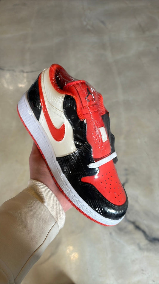 Jordan 1 low team orange