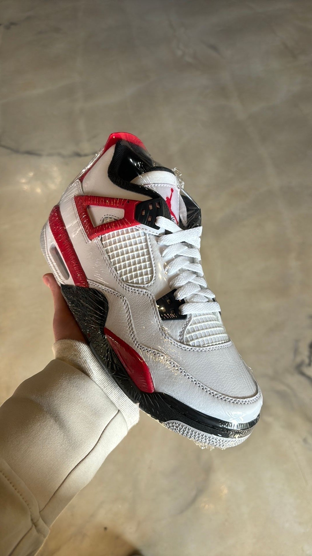 Jordan 4 red cement